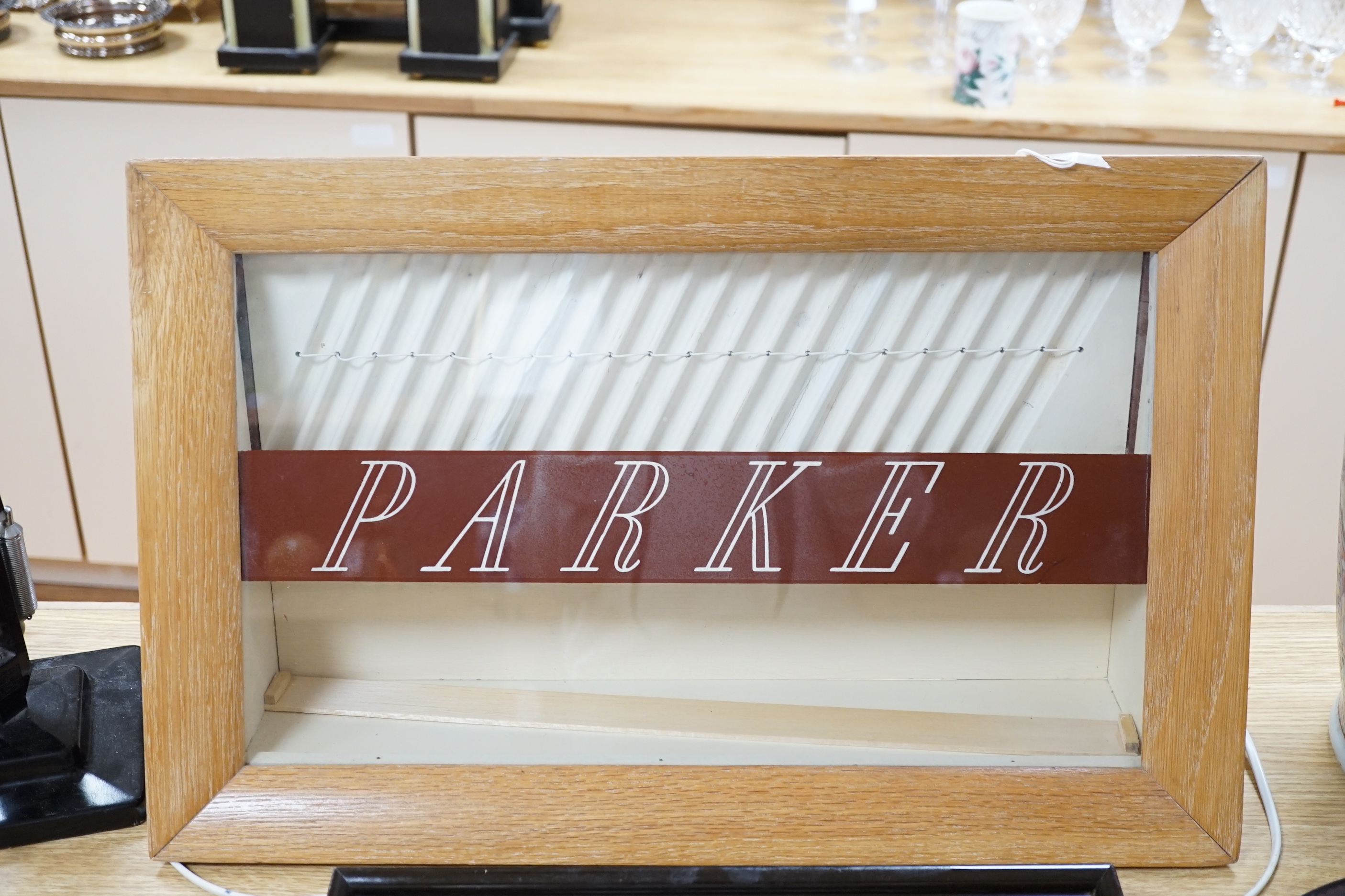 A vintage oak framed Parker fountain pen display case, 57.5cm x 37cm